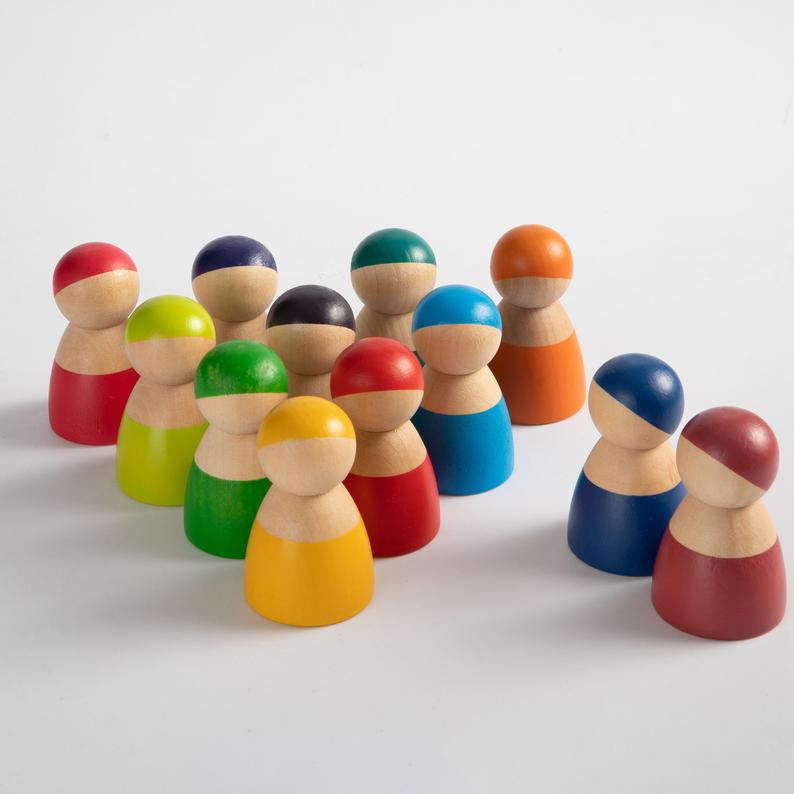 **Pre-order (Ships in 2-3 Weeks)**12-Piece Rainbow Wooden Peg Dolls – Primary Color