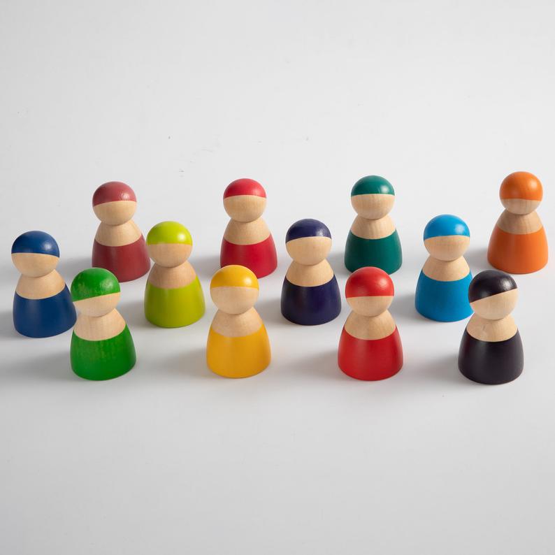 **Pre-order (Ships in 2-3 Weeks)**12-Piece Rainbow Wooden Peg Dolls – Primary Color